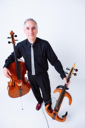 photo of Cellobop performer Gideon Freudmann with classical cello and electric cello